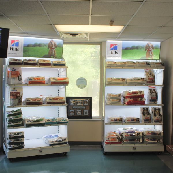 A store interior showcasing shelves stocked with brands of dog food